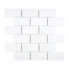White rectangular tile mosaic from Thassos Supreme 2x4 straight-edged brick marble