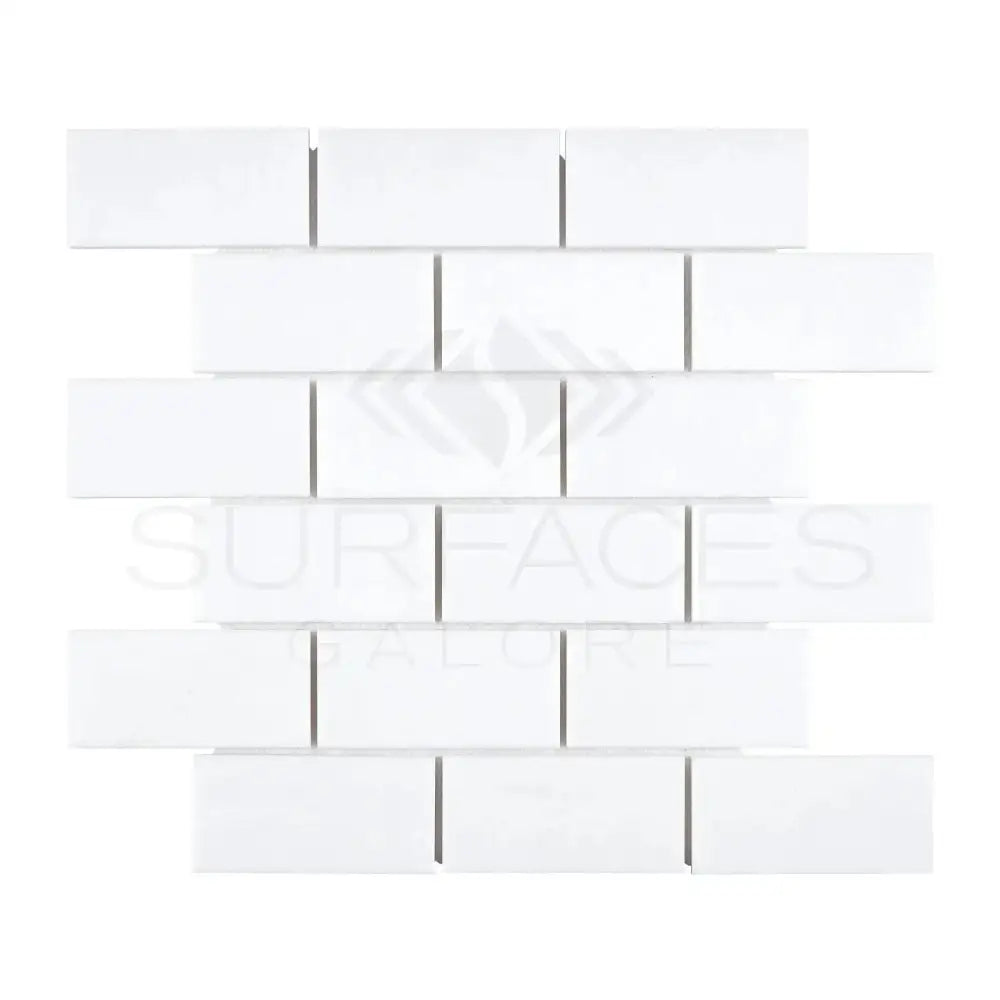 White rectangular tile mosaic from Thassos Supreme 2X4 Straight-Edged Brick Marble