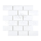 White rectangular tile mosaic from Thassos Supreme 2X4 Straight-Edged Brick Marble