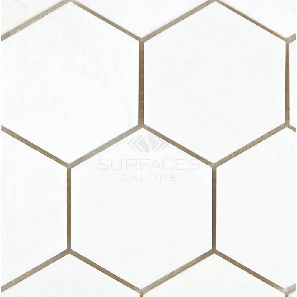 White hexagon tile pattern featuring Thassos Supreme 3-inch marble mosaic