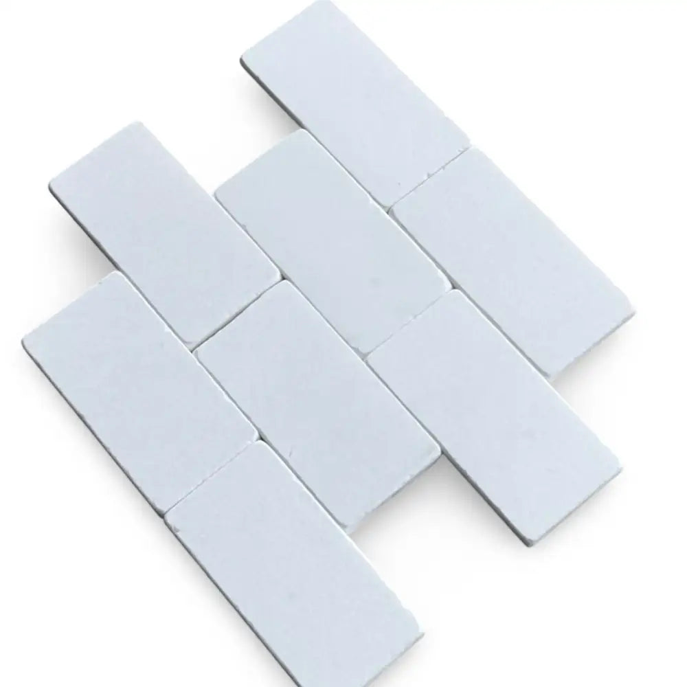 White rectangular Thassos Supreme 3X6 Marble Tumbled tiles for elegant flooring