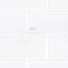 White rectangular Thassos Supreme 3x6 Marble Tumbled tiles for elegant flooring