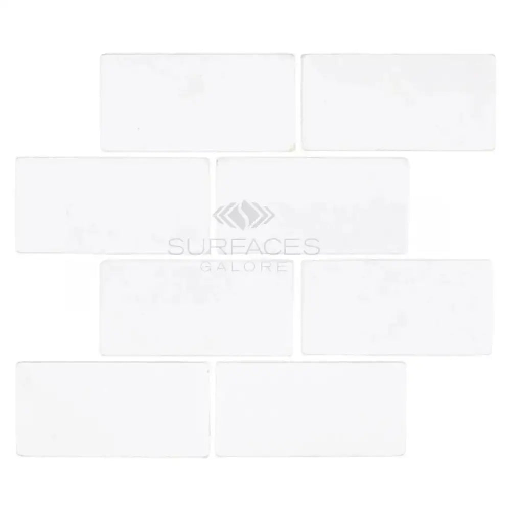 White rectangular Thassos Supreme 3x6 marble tiles tumbled for elegant flooring and walls