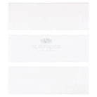 Three white rectangular Thassos Supreme marble tiles with deep-beveled edges