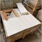 Wooden crate filled with Thassos Supreme 4x12 Marble tiles polished or honed