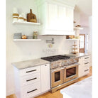 Stainless steel gas range with Thassos Supreme Marble countertop for modern kitchen