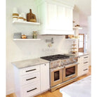 Stainless steel double oven range in Thassos Supreme 4X12 Marble finish