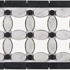 Decorative marble tile border with Thassos Supreme White Carrara and Black Dots
