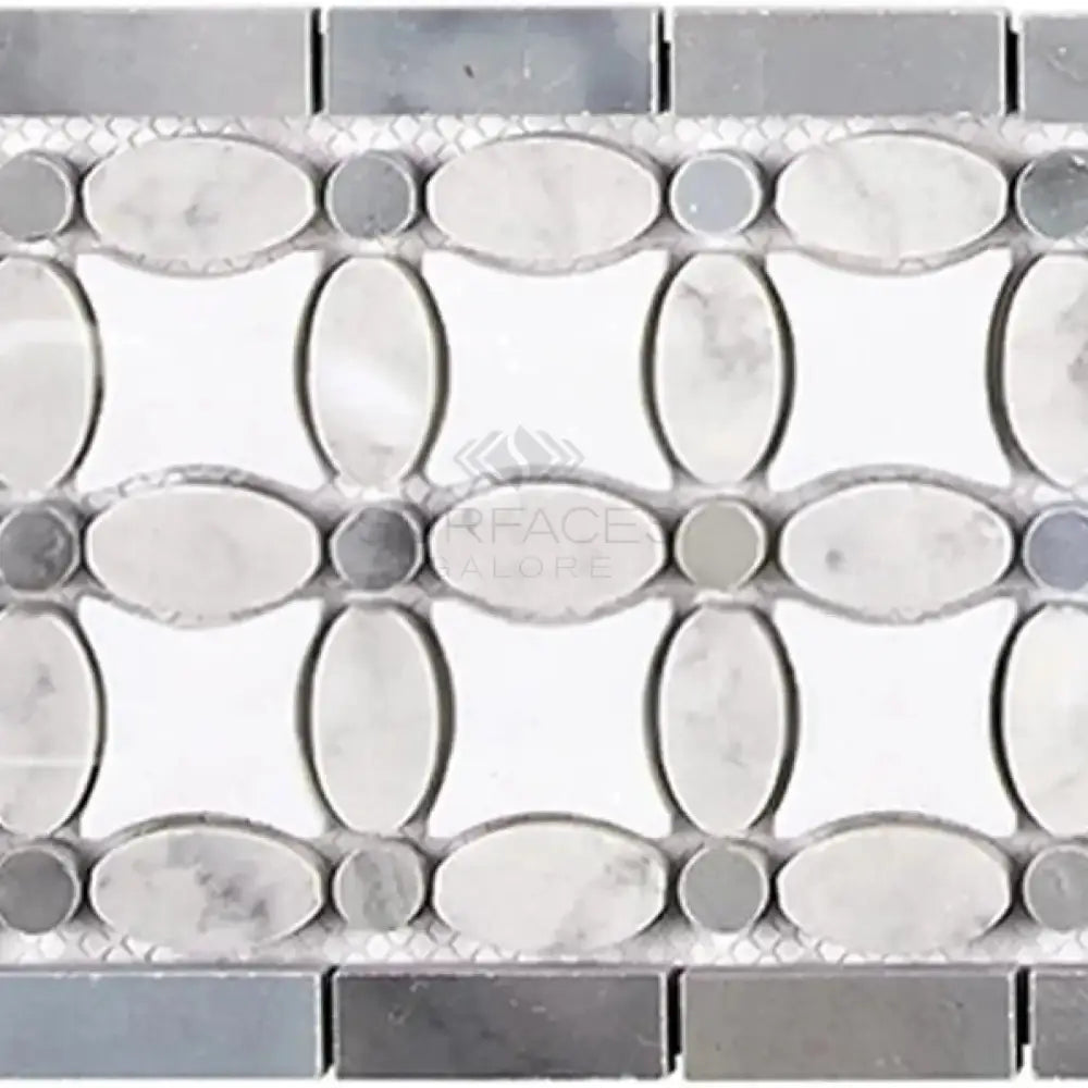 Decorative marble tile border featuring Thassos Supreme, White Carrara, and Blue-Gray stones