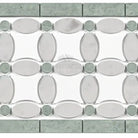 Decorative tile border featuring Thassos Supreme and Florida Flower design in marble