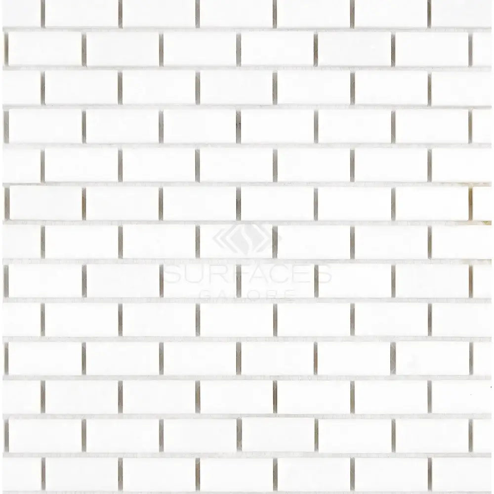 White brick tile pattern of Thassos Supreme 5/8X1 1/4 Mini-Brick Marble Mosaic
