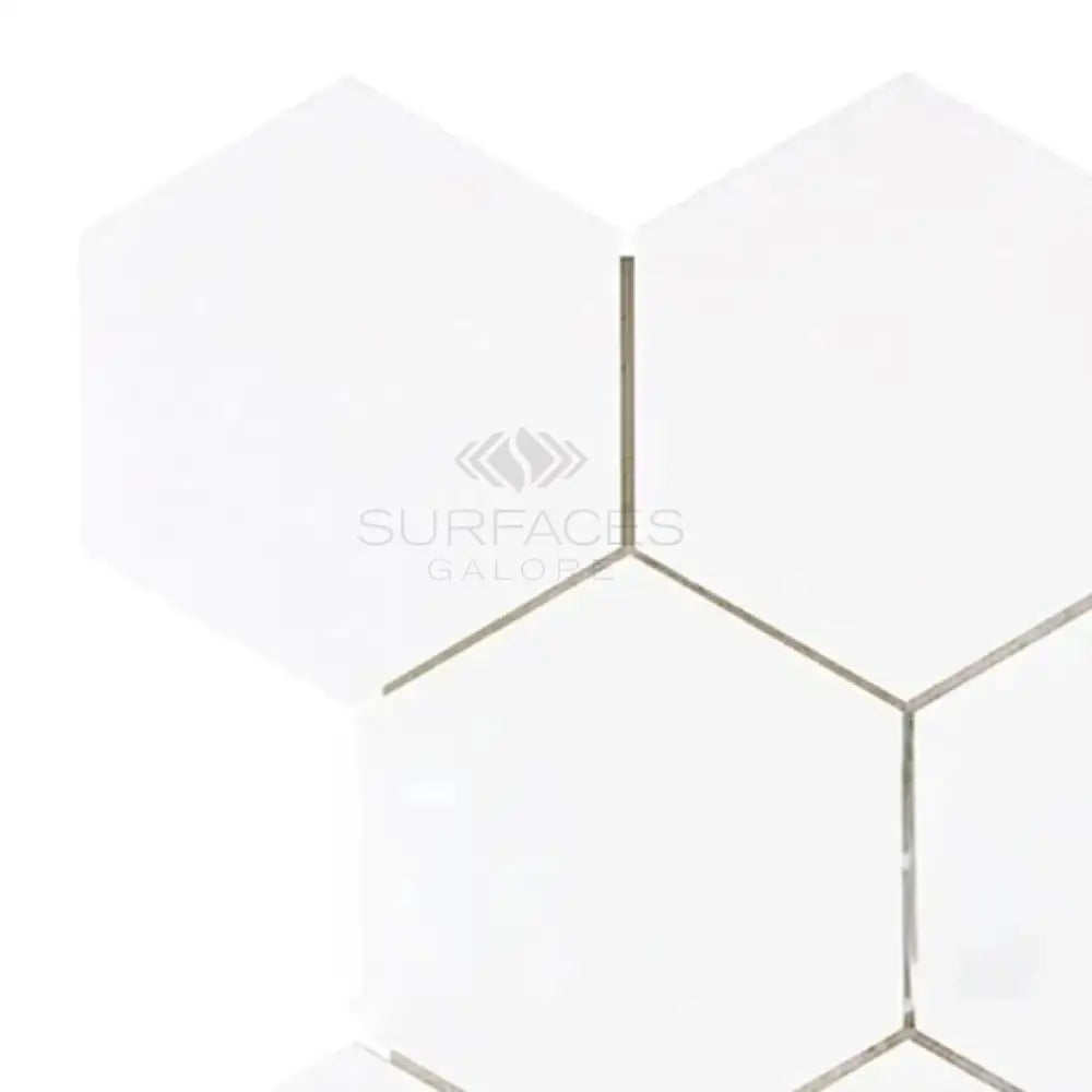 White hexagonal tiles from Thassos Supreme 5 inch Hexagon Mosaic Marble in polished or honed finish