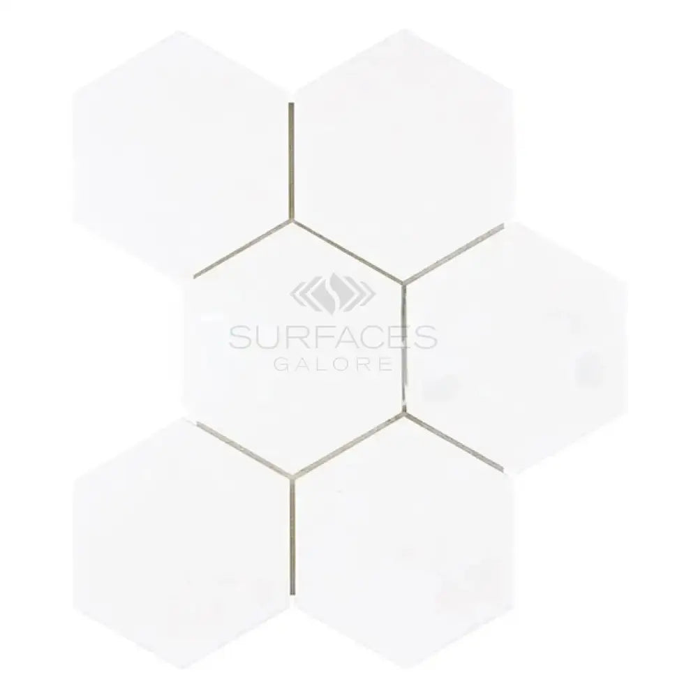 White hexagonal tile mosaic from Thassos Supreme 5in Marble Hexagon Mosaic collection