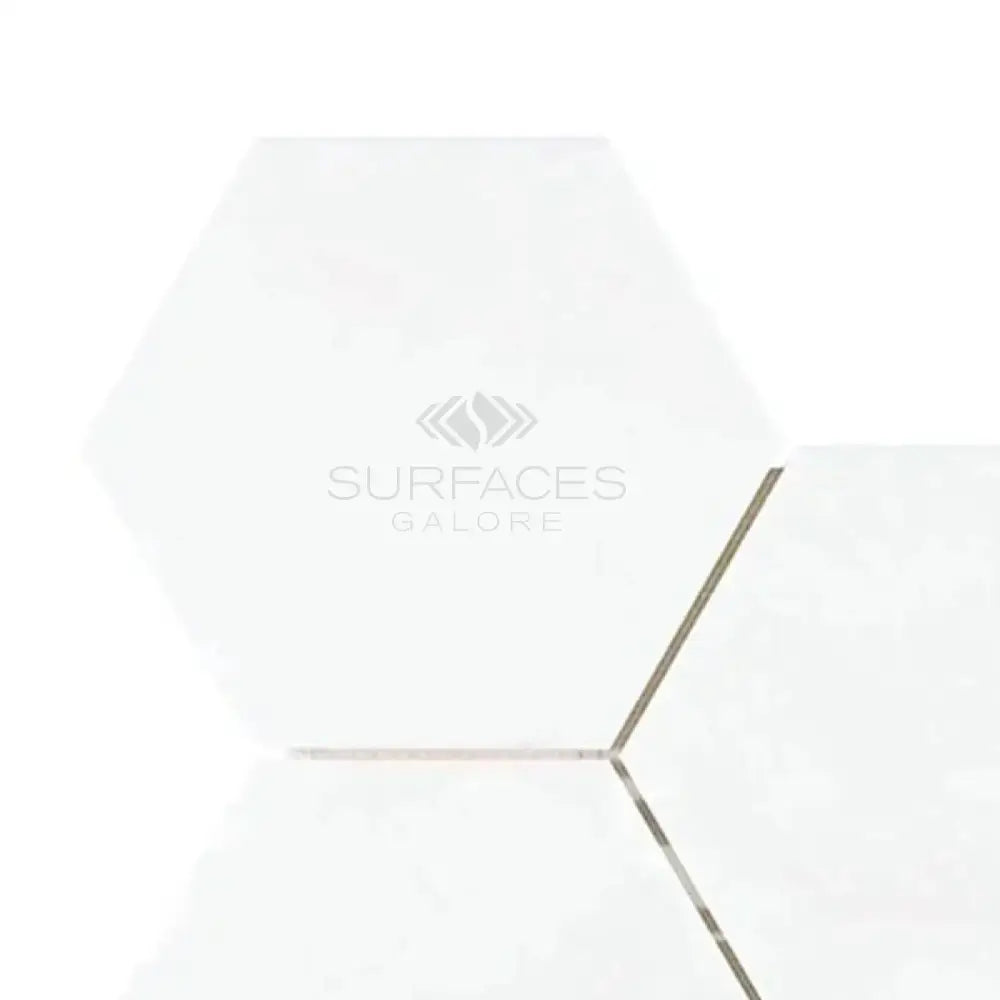 White hexagonal marble tiles from Thassos Supreme 6-inch Hexagon Mosaic for elegant flooring