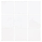 Nine white square Thassos Supreme 6X6 Marble Tumbled tiles for flooring or backsplash