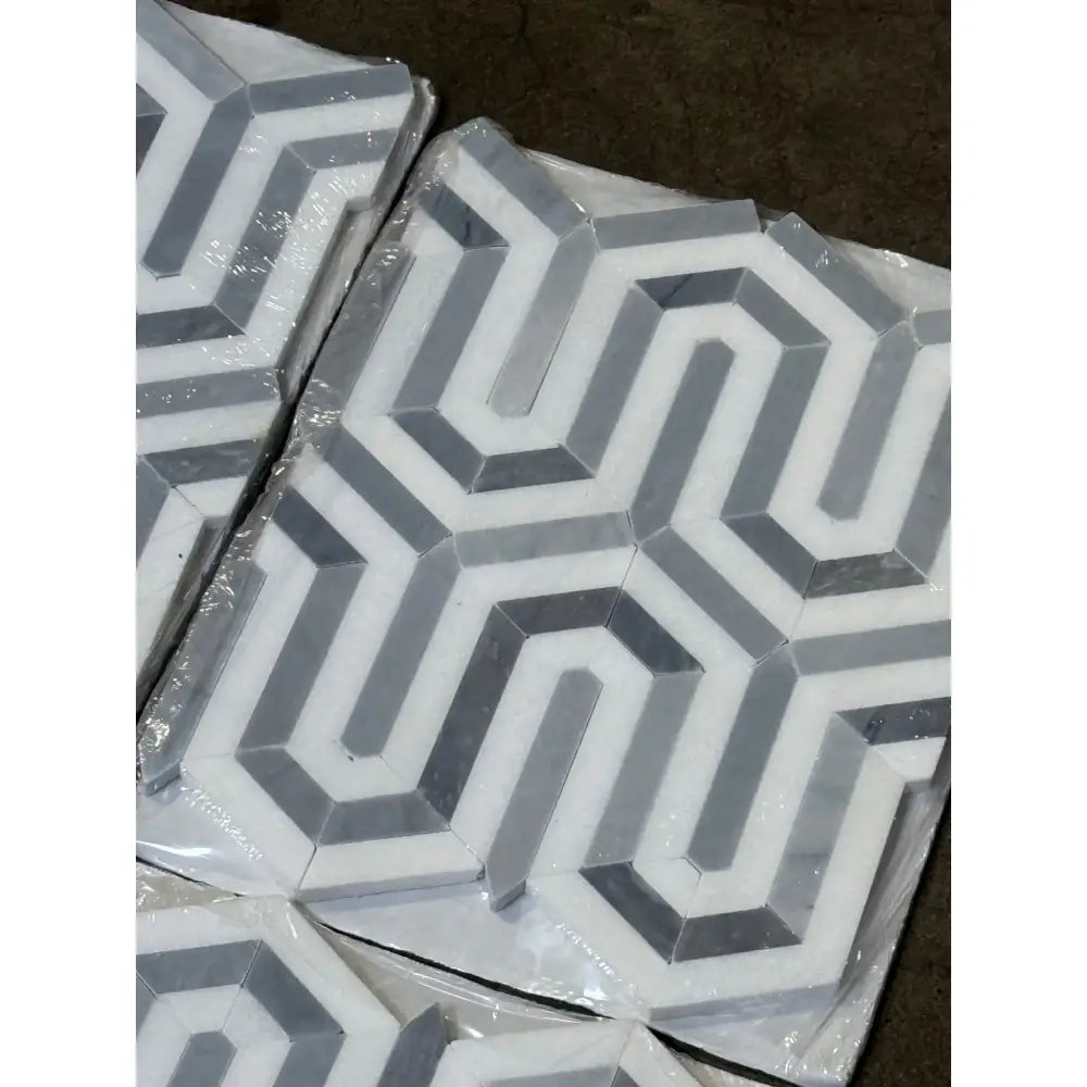 Geometric patterned tile from Thassos Supreme Berlinetta Design with Blue-Gray mosaic marble