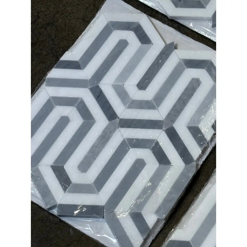 Geometric gray and white tile pattern from Thassos Supreme Berlinetta Blue Gray Mosaic Marble