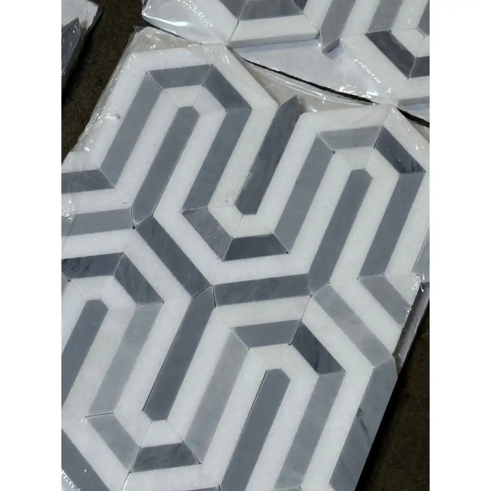 Geometric gray and white tile pattern from Thassos Supreme Berlinetta Mosaic Marble