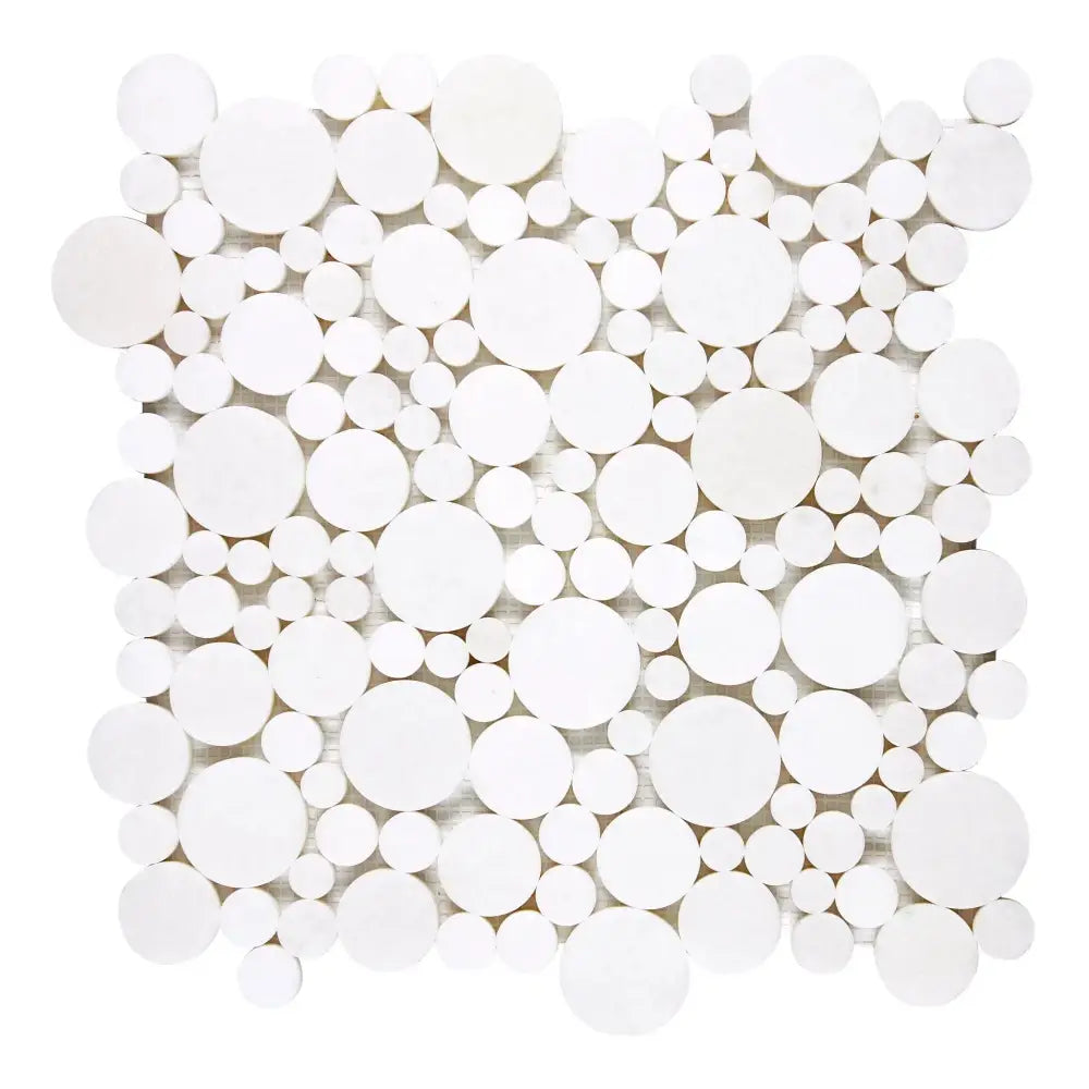 White circular mosaic tile pattern in Thassos Supreme Bubbles Mosaic Marble