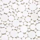White circular mosaic tile pattern from Thassos Supreme Bubbles Marble product