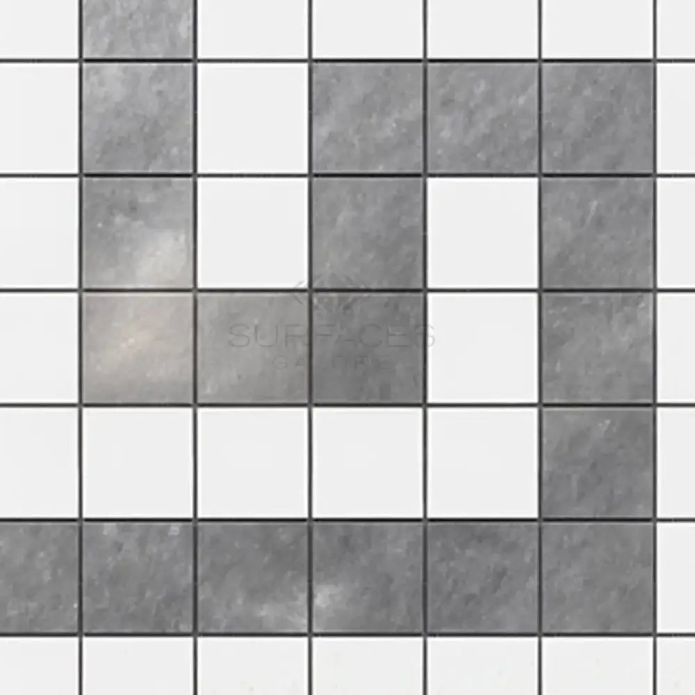 Gray and white tiled surface featuring Thassos Supreme Greek Key Border Marble corner