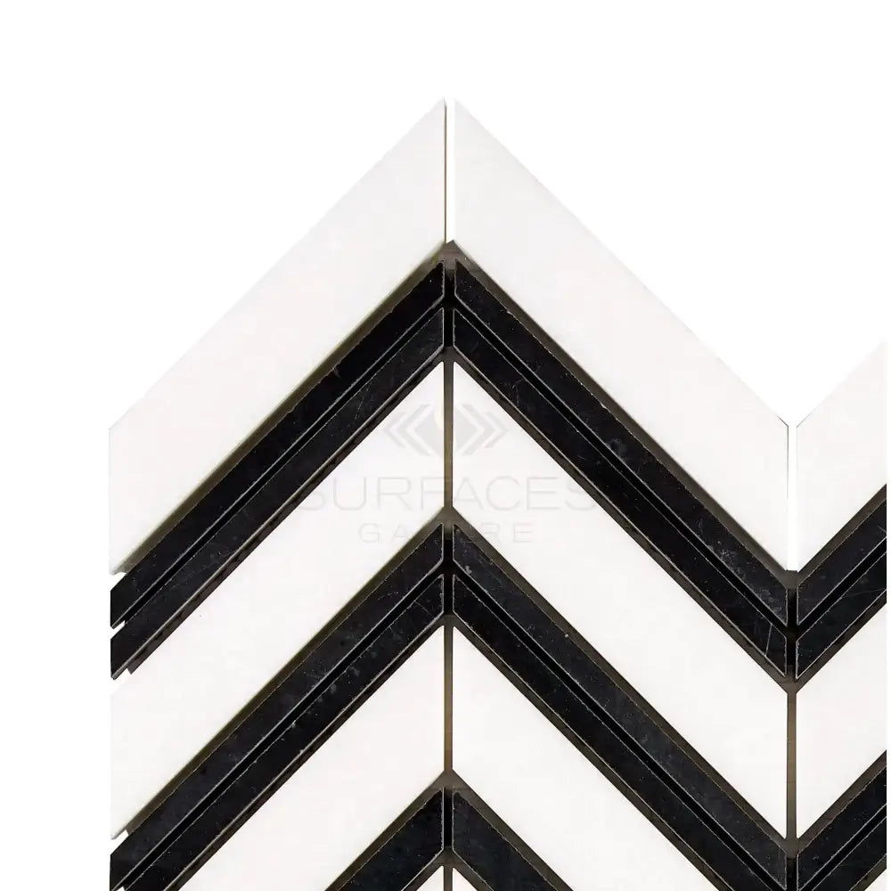 Black and white chevron tile pattern on Thassos Supreme Large Chevron Mosaic Marble