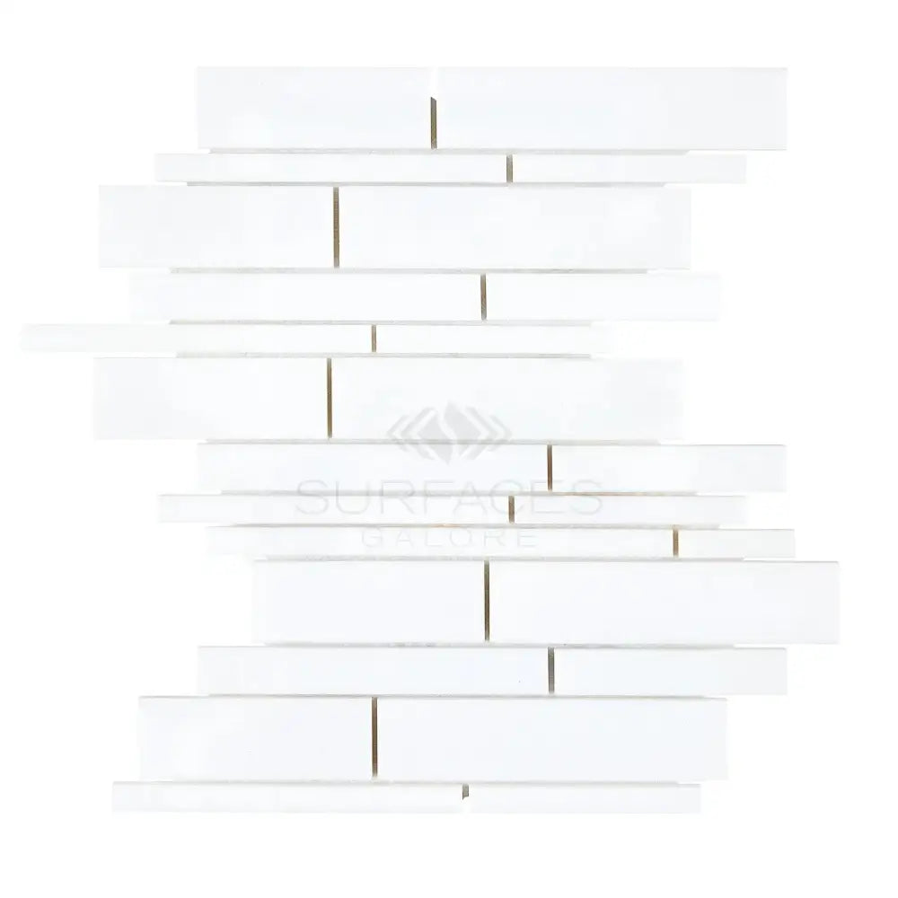 White rectangular mosaic tile from Thassos Supreme Manhattan Random-Strip Marble collection