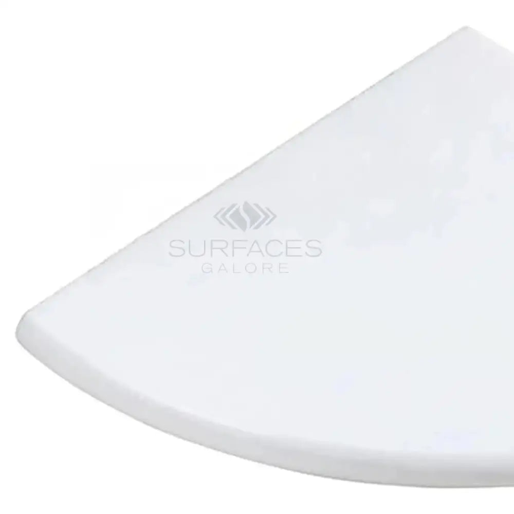 White quarter-circle marble shower corner shelf from Thassos Supreme Resin Collection