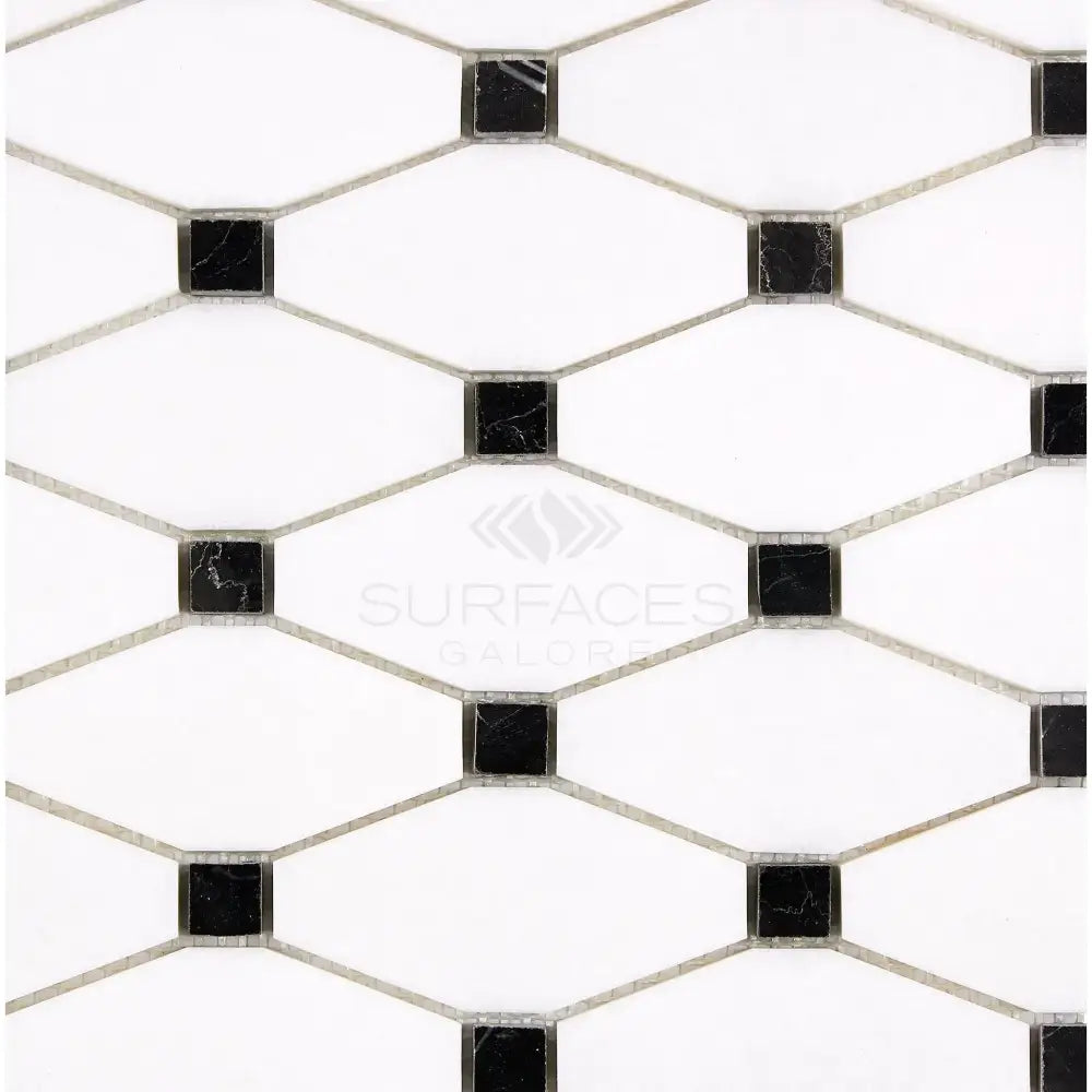 Black and white mosaic tile pattern in Thassos Supreme Octave Marble flooring