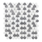Circular gray and white mosaic tile from Thassos Supreme Penny-Round marble collection