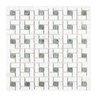 White and green mosaic tile pattern from Thassos Supreme Pinwheel Mosaic collection